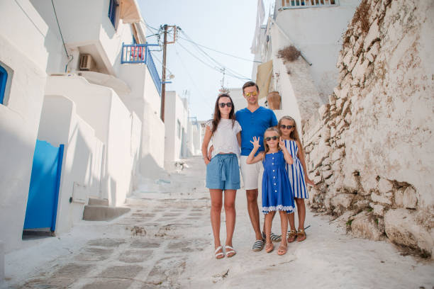 istock Family having fun outdoors on Mykonos streets 1177403180