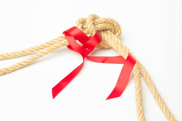 istock Rope and red ribbon 1177403719