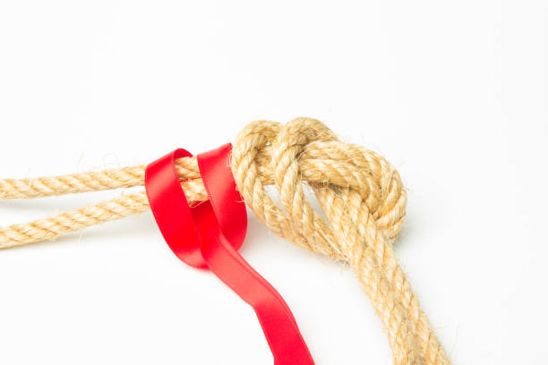 istock Rope and red ribbon 1177403754