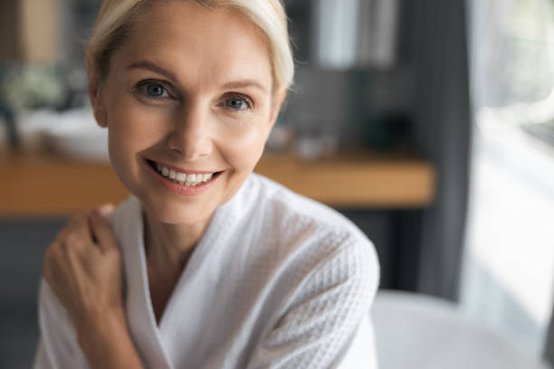 istock Positive delighted blonde woman posing on camera 1177403794