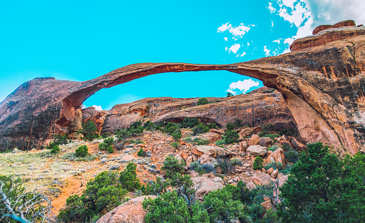 Landscape Arch made of sandstone seen in Arches National Park near the city of Moab in Utah, USA.