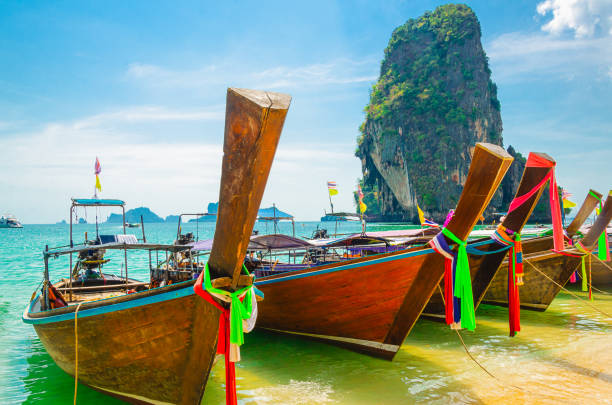 Longtail boat railway beach thailand Andaman sea with long tail boat tropical island ao ton sai stock pictures, royalty-free photos & images