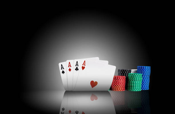 istock Four aces standing on a mirror surface with a backlight, ahead of a colorful chips in piles. Black background. Gambling entertainment. Close-up 1177406688