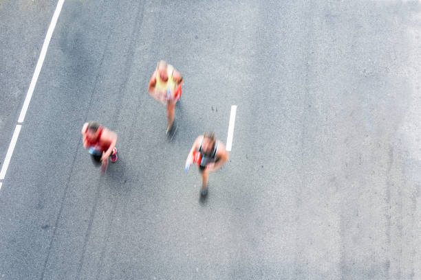 istock Athletes running on the city road 1177407648