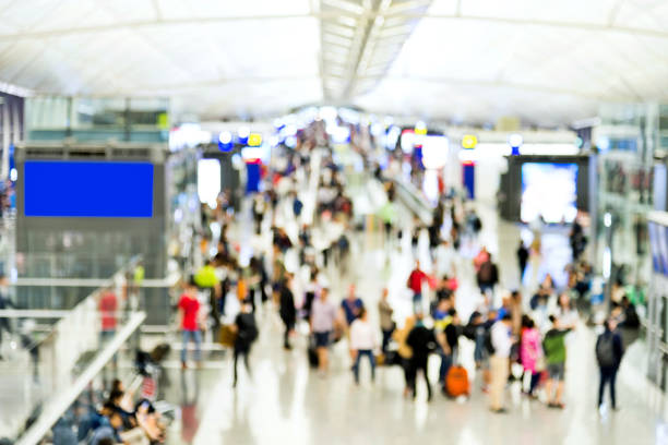 istock Group of people walking in airport 1177407787
