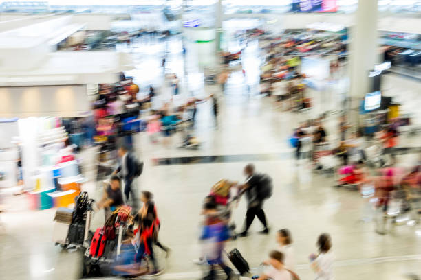 istock Group of people walking in airport 1177407790