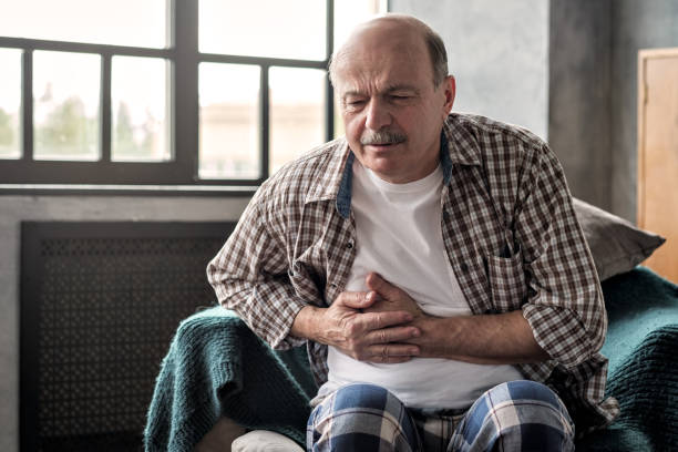 istock Senior hispanic man is having pancreatitis or gastritis or colitis. 1177408208