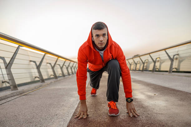 istock Determined sportive young man standing on a footbridge 1177409273