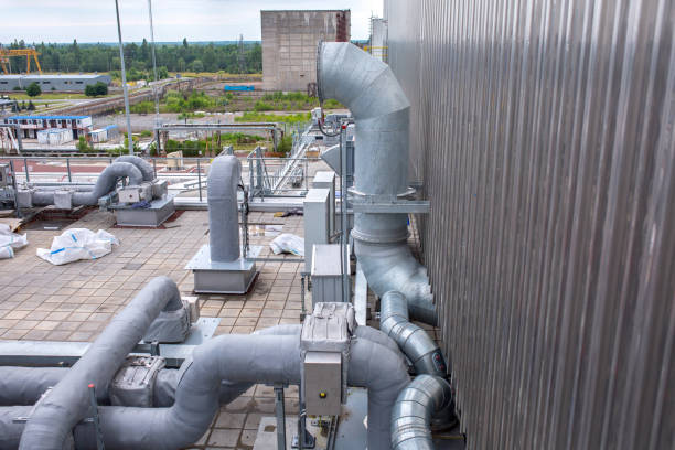 istock External infrastructure of the microclimate support system at a large industrial site. Air pipelines inlet and exhaust. Fans and air conditioning. Systems of control of pressure, humidity, temperature 1177409428