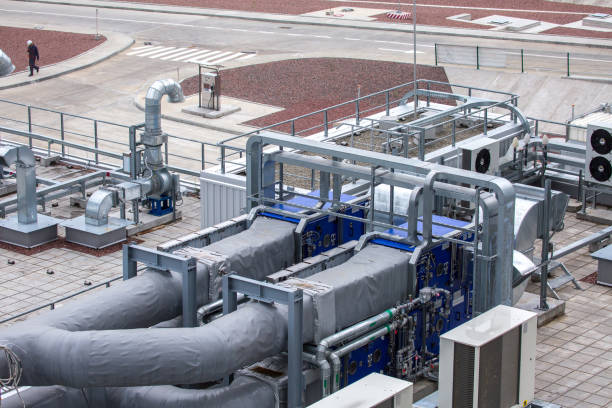 istock External infrastructure of the microclimate support system at a large industrial site. Air pipelines inlet and exhaust. Fans and air conditioning. Systems of control of pressure, humidity, temperature 1177409639