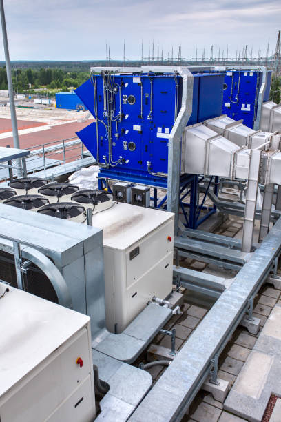 istock External infrastructure of the microclimate support system at a large industrial site. Air pipelines inlet and exhaust. Fans and air conditioning. Systems of control of pressure, humidity, temperature 1177409973