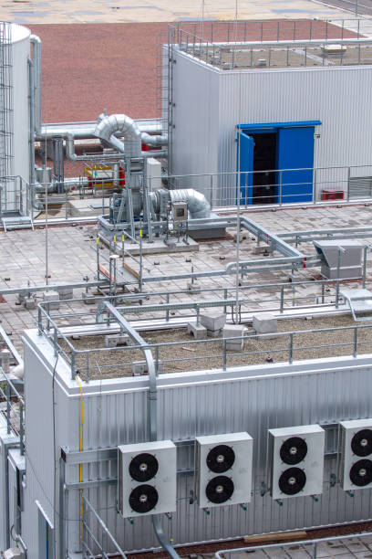 istock External infrastructure of the microclimate support system at a large industrial site. Air pipelines inlet and exhaust. Fans and air conditioning. Systems of control of pressure, humidity, temperature 1177410022