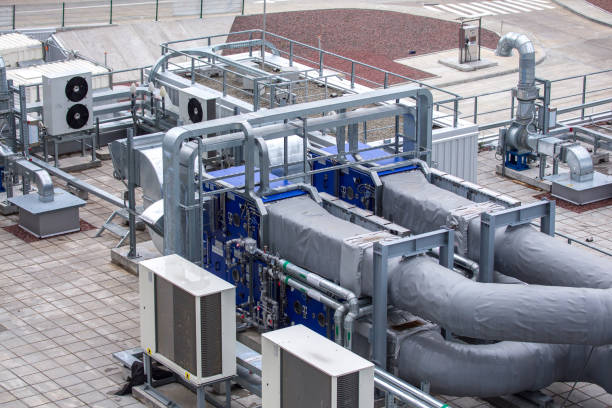 istock External infrastructure of the microclimate support system at a large industrial site. Air pipelines inlet and exhaust. Fans and air conditioning. Systems of control of pressure, humidity, temperature 1177410582