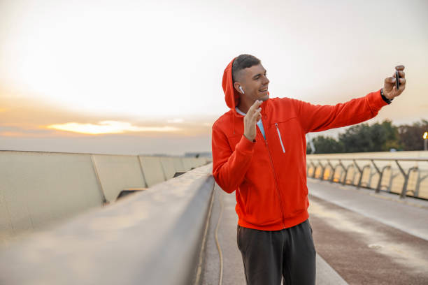 istock Smiling sportive young boy taking a selfie 1177410606