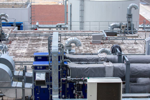 istock External infrastructure of the microclimate support system at a large industrial site. Air pipelines inlet and exhaust. Fans and air conditioning. Systems of control of pressure, humidity, temperature 1177410676