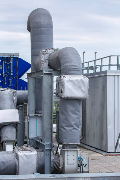 istock External infrastructure of the microclimate support system at a large industrial site. Air pipelines inlet and exhaust. Fans and air conditioning. Systems of control of pressure, humidity, temperature 1177411272