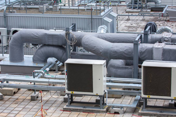 istock External infrastructure of the microclimate support system at a large industrial site. Air pipelines inlet and exhaust. Fans and air conditioning. Systems of control of pressure, humidity, temperature 1177411661