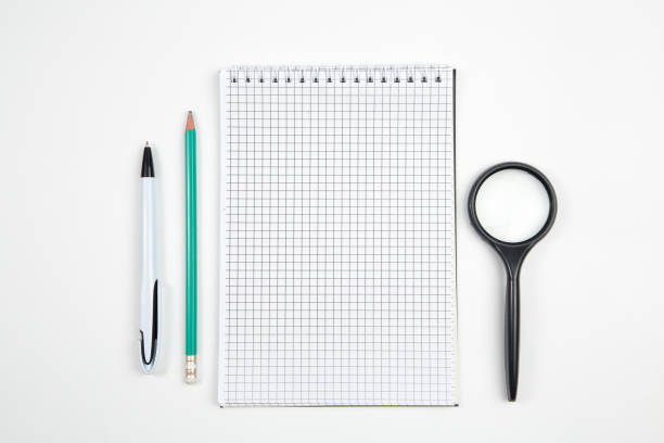 istock paper notebook with pen or pencil on white isolated background. top view. flat lay . mockup 1177412361