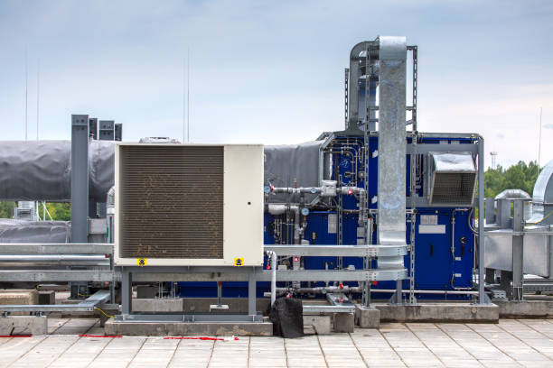 istock External infrastructure of the microclimate support system at a large industrial site. Air pipelines inlet and exhaust. Fans and air conditioning. Systems of control of pressure, humidity, temperature 1177412635