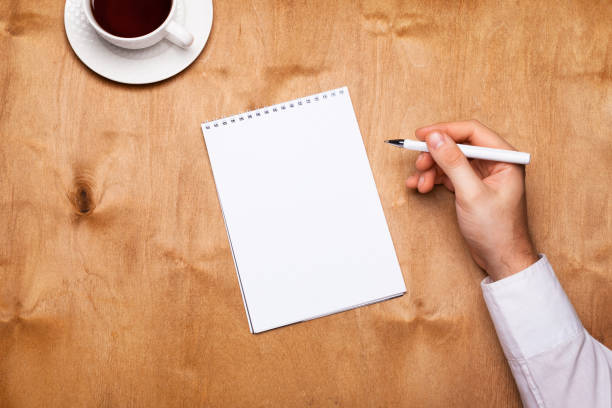istock Planning 2020 in a notebook with men's hands 1177412771