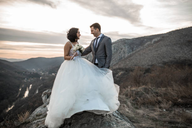 istock Happy newlywed couple on mountain 1177413725