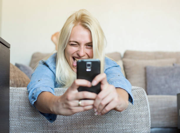 istock Beautiful woman with mobile phone 1177415925