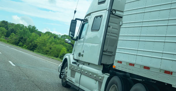 istock Truck on a highway in US, closeup side view 1177417912