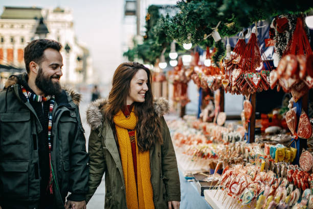 istock Young couple shopping for Christmas 1177419029