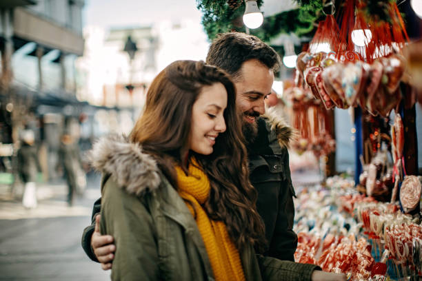 istock Young couple shopping for Christmas 1177419154