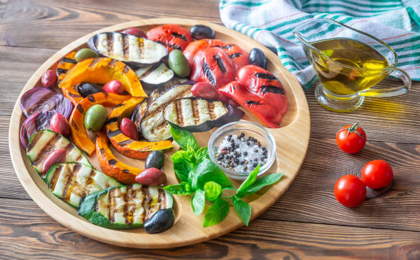 istock Grilled vegetables on the wooden tray 1177419820