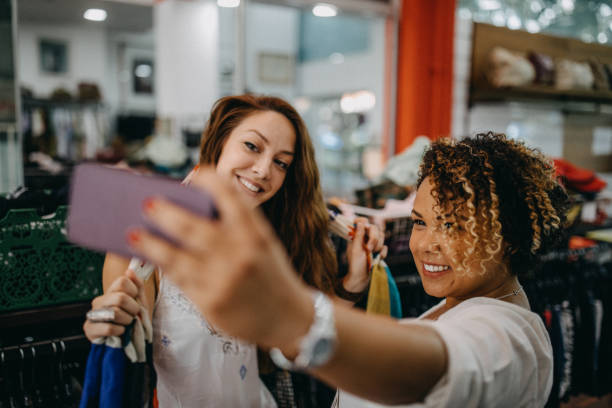istock Young women vintage clothes shopping 1177421685