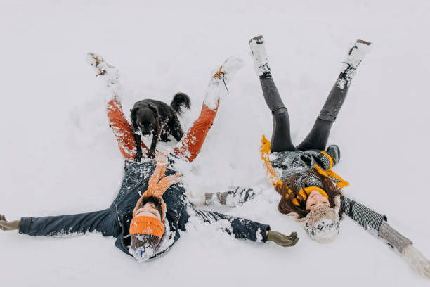 istock Couple in the snow playing 1177424651