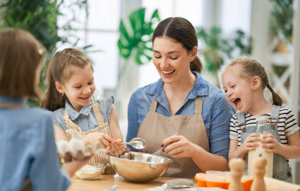 istock family are preparing bakery together 1177424681