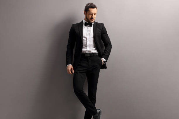 istock Man in a black suit and bow tie 1177424785