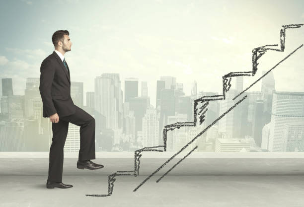 istock Business man climbing up on hand drawn staircase concept 1177424842