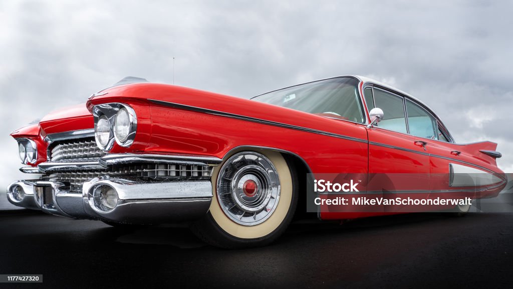 Side view of a classic american car from the fifties. Side view of a classic american car from the fifties. The car is in excellent condition given the glossy paint and chrome. Car Stock Photo