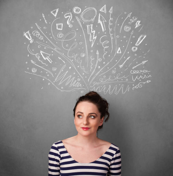 istock Young woman thinking with sketched arrows above her head 1177430004