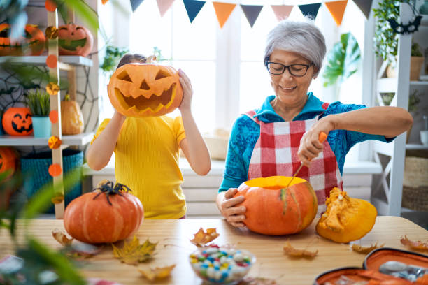 istock family preparing for Halloween 1177430351