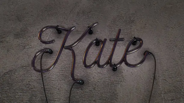 Neon sign spelling the girls name of Kate, on a concrete grunge background with the sign's power turned off