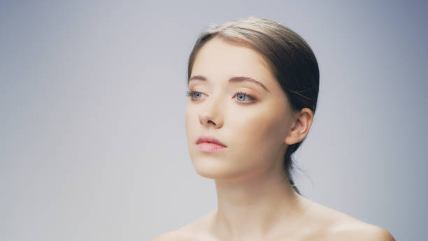 istock Delicate, shy woman face skin care 1177431053