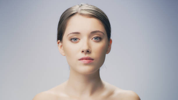 istock Delicate, shy woman face skin care 1177431669