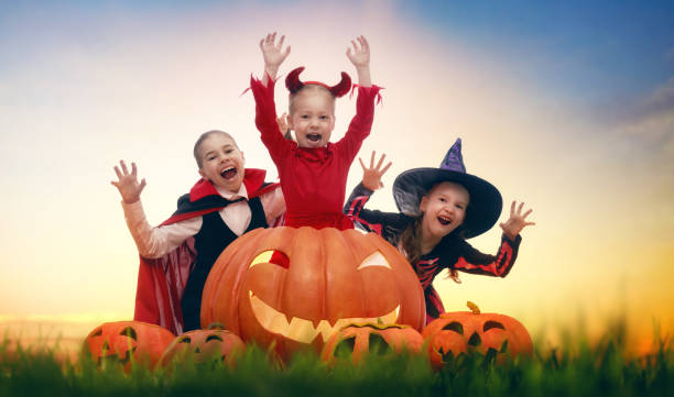 istock kids in Halloween carnival costumes 1177436169