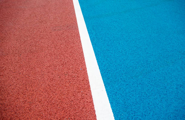 istock Red and blue running track background 1177436378