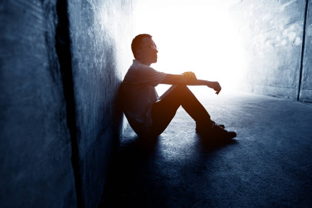 istock Desperate man sitting in the tunnel 1177436898