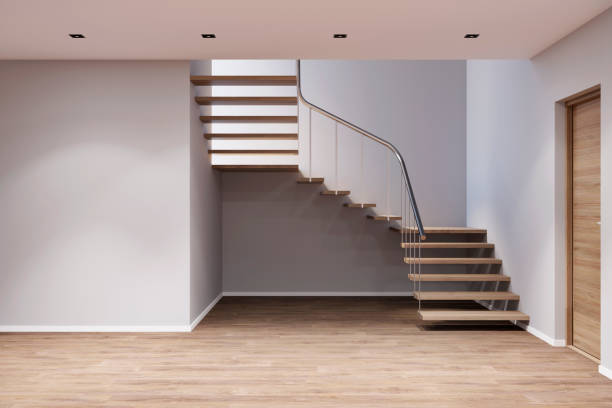 istock An empty entrance hall with stairs, doors, mock up wall 1177437793