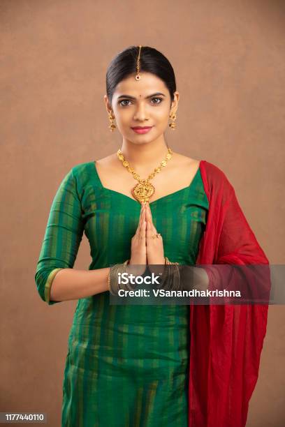 Pretty Indian Young Woman Praying Stock Photo - Download Image Now - India, Culture of India, Indian Ethnicity