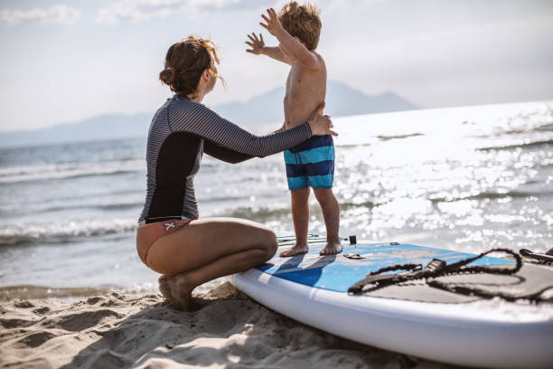 istock Surfing Lessons for my little one 1177440464