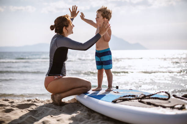 istock Surfing Lessons for my little one 1177440565