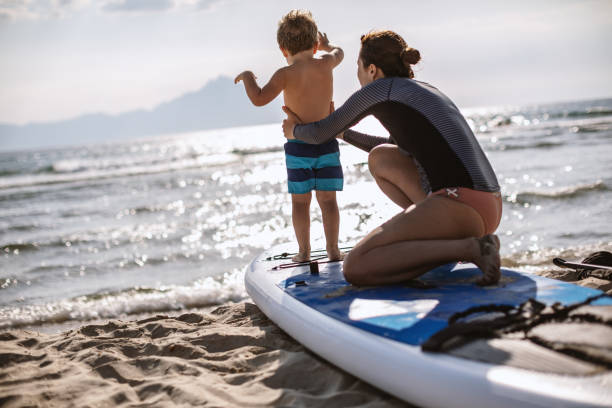 istock Surfing Lessons for my little one 1177441661
