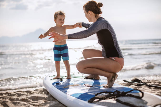 istock Surfing Lessons for my little one 1177442123